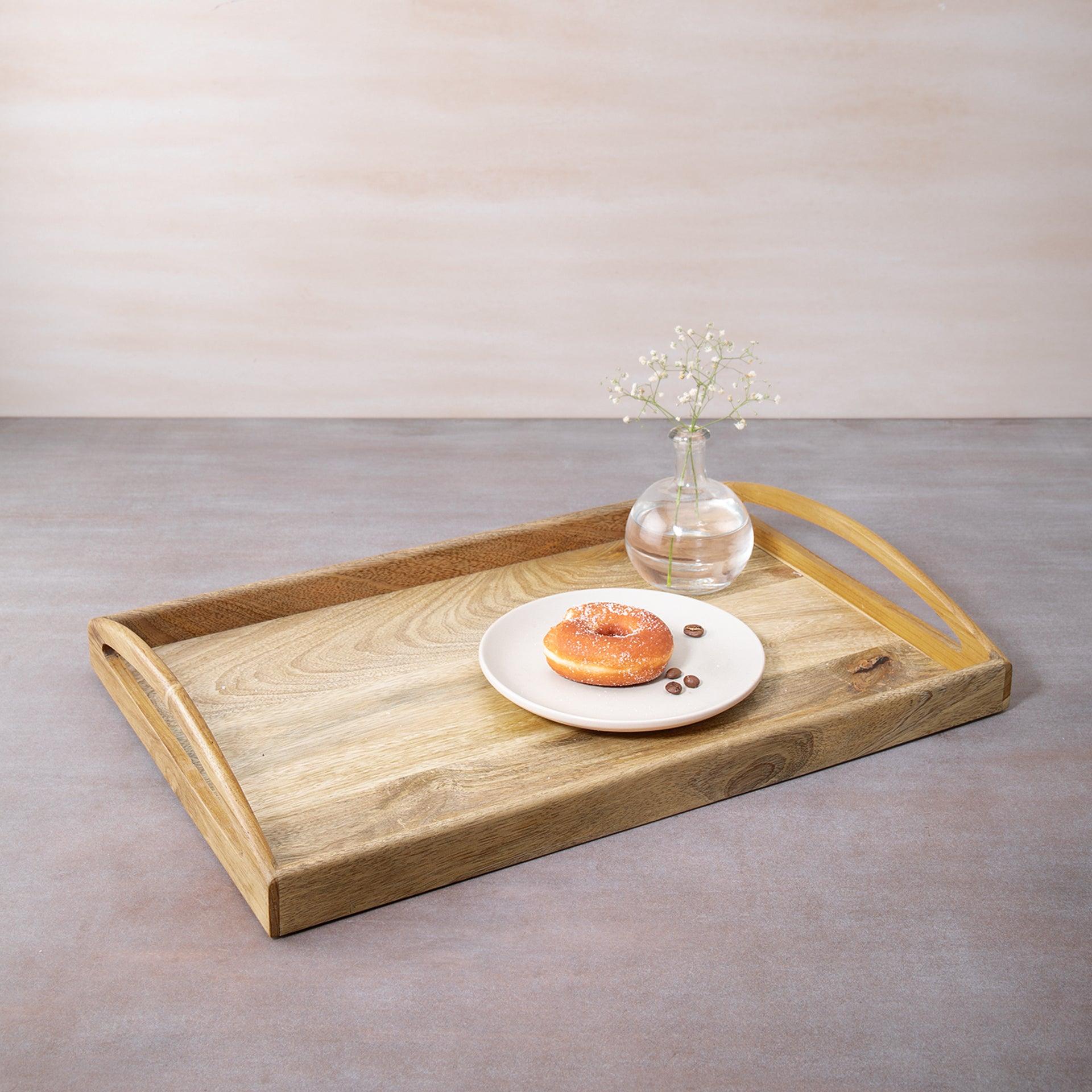 in teak wooden tray